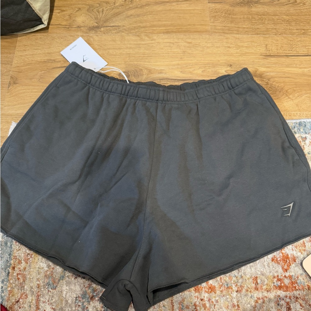 Brand new gymshark fleece shorts size Large in green